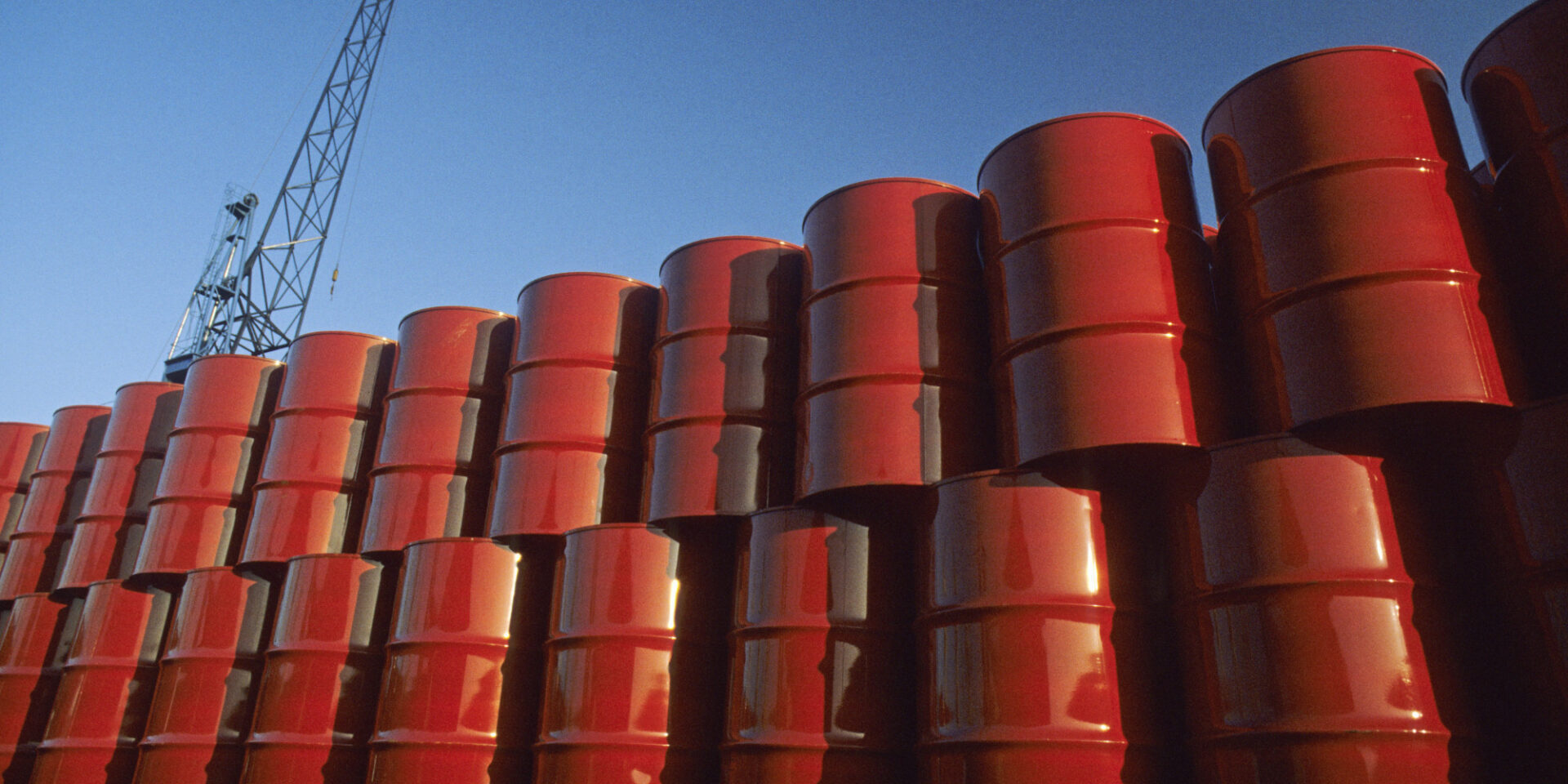 oil drums Red metal barrels against blue sky.